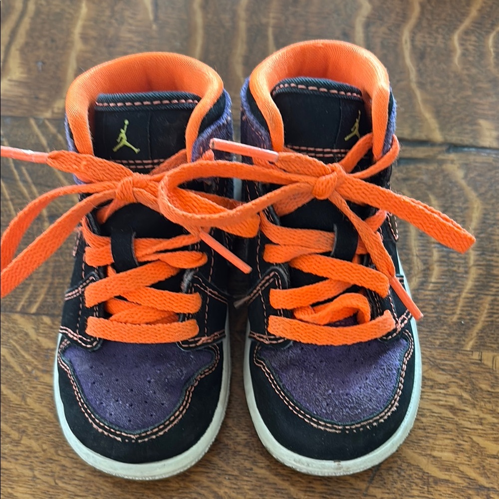 Nike Black and Orange High-Top Sneakers for Basketball